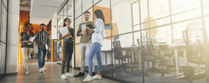 company-employees-talking-in-hallway_436037546